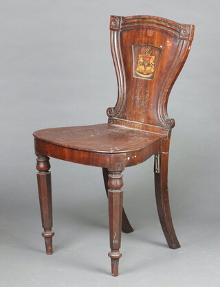 A 19th Century mahogany hall chair, the shaped solid back with armorial, solid seat, raised on turned supports 86cm h x 45cm w x 38cm d 