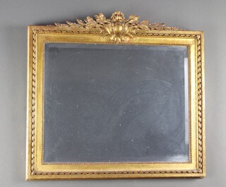 A 19th Century  style rectangular bevelled plate wall mirror contained in a decorative gilt painted plaster and carved wood frame 59cm x 62cm 