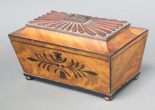 A William IV rectangular inlaid mahogany twin compartment tea caddy with hinged lid raised on bun feet 17cm h x 30cm x 17cm d 