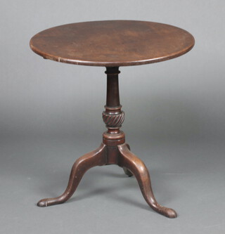 A 19th Century circular mahogany snap top tea table raised on pillar and tripod base 71cm h x 68cm diam. 