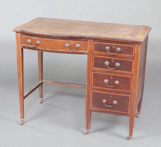 An Edwardian inlaid mahogany desk with inset brown writing surface above 1 long and 4 short drawers, raised on square supports 75cm h x 90cm w x 49cm d 