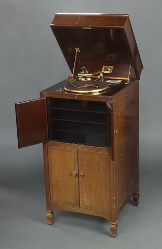 A His Master's Voice standard gramophone model 192, contained in a mahogany case enclosed by panelled doors, raised on square tapered supports, spade feet, the interior marked H Taylor & Sons, Bridge Street, Walsall  113cm h x 53cm w x 53cm d, 