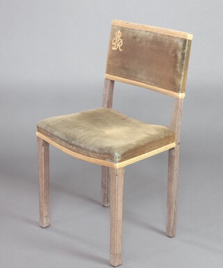 A George VI limed oak Coronation chair, the base marked B North & son, West Wycombe, Coronation 87cm h x 49cm w x 37cm d 