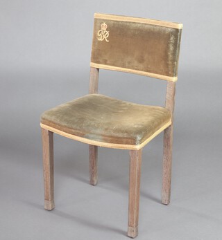 A George VI limed oak Coronation chair, the base marked B North & Son, West Wycombe, Coronation 87cm h x 49cm w x 37cm d 