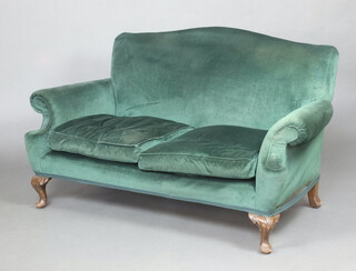 A near pair of Queen Anne style two seat sofas upholstered in green material, raised on cabriole supports 94cm h x 134cm w x 70cm d 