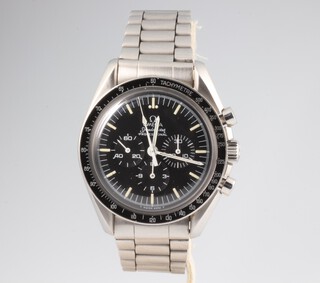 Omega, a gentleman's steel cased Omega Speedmaster Professional wristwatch with black dial and bezel contained in a 42mm case, the case numbered ST145022 with original dust cover, the movement numbered 48220541 with white luminous hands and batons with triple subsidiary dials, the case back inscribed "The first watch worn on the moon, flight qualified by Nasa for all manned space missions" the bracelet numbered 1171/1 with original glass and a box and outer box  