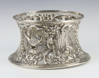 A Georgian style repousse silver dish ring decorated with exotic birds, flowers, serpent and fox, Chester 1901, makers George Nathan & Ridley Hayes 19cm, 425 grams 