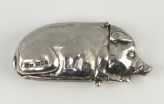 A Victorian style novelty silver vesta in the form of a reclining pig, London 1990, maker David A Bowles, 7cm, 60 grams 