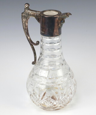 A cut glass ewer with a silver mount (lacking lid), Sheffield 1955, 25cm 