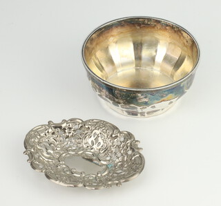 A silver bowl Sheffield 1932, together with a repousse silver dish 119 grams 