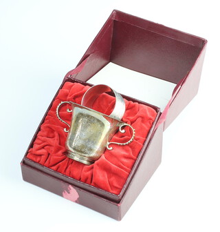 A silver 925 standard Royal Wedding 1981 commemorative 2 handle cup no.76 of 100, 6cm, cased, together with a napkin ring, gross weight 95 grams  