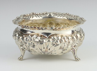 A Victorian repousse silver bowl with scroll feet and floral decoration Sheffield 1869, 10cm, 120 grams 