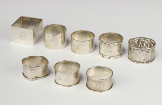 A silver napkin ring Sheffield 1906, 7 others, 297 grams 