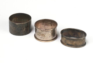 A silver napkin ring Birmingham 1945 and 2 others, 59 grams 