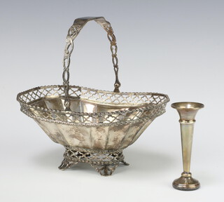An Edwardian silver swing handled bon bon basket on scroll feet Chester 1906, 15cm, 234 grams together with a silver spill vase 