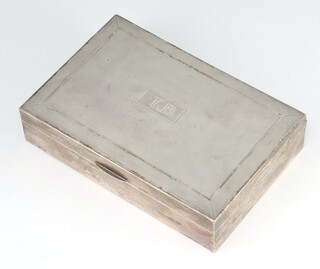 An Art Deco style rectangular silver engine turned box with engraved monogram, Birmingham 1963, 17cm  