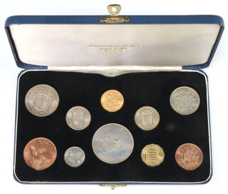 A 1965 Royal Mint coin set including a 1965 sovereign, cased 