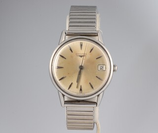 A gentleman's Longines steel cased automatic calendar wristwatch with 22mm case on an expanding bracelet 