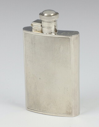 A silver engine turned hip flask Sheffield 1936 84 grams, 10cm 