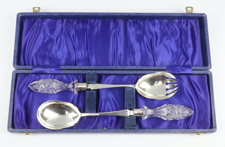 A pair of cased silver and cut glass salad servers Sheffield 1914 