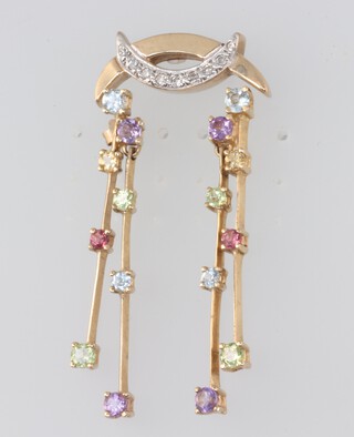 A pair of yellow metal 9ct gem set drop earrings and a white 9k diamond set pendant 