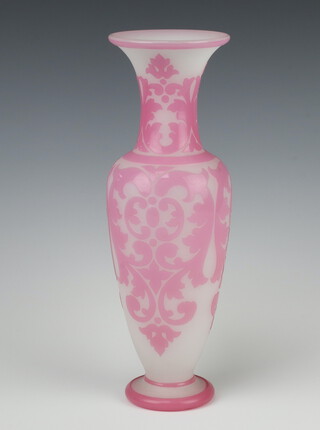 A Victorian overlay 2 colour glass oviform vase decorated with geometric pattern 30cm 