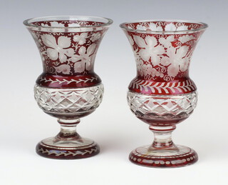 A near pair of 19th Century Bohemian red glass thistle shaped vases decorated with vinous decoration 16cm 