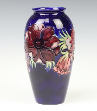 A modern Moorcroft oviform vase, the blue ground decorated anemone, impressed marks 25cm 