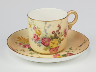 A Royal Worcester blush porcelain tea cup and saucer decorated with flowers  