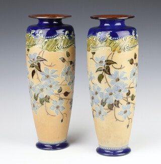 A pair of Royal Doulton oviform vases decorated with flowers 36cm 