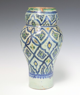 An Ismic pottery vase of waisted form the base with signature 35cm 