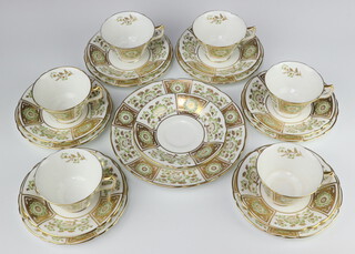 A Royal Crown Derby green Derby Panel part tea set comprising 6 tea cups, 6 saucers, 6 small plates and a sandwich plate (all seconds) 
