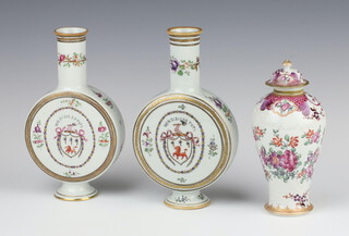 A 19th Century Samson baluster vase and cover decorated with flowers 18cm, together with a similar pair of moon vases decorated with an armorial 19cm 