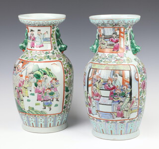 A pair of 18th Century style Chinese famille rose baluster vases with lion handles and panels of figures in pavilion settings 37cm 