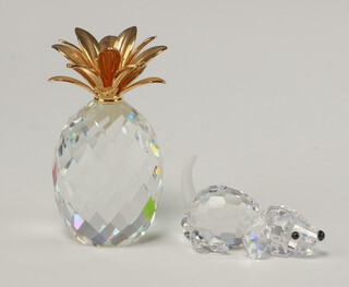 A Swarovski Crystal  pineapple 5cm and a ditto puppy 4cm, boxed 