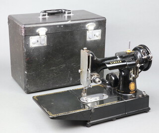 A Singer Featherweight electric sewing machine no.222K, cased with foot control pedal (no lead or mat)  