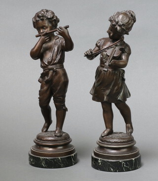 A pair of 19th Century French spelter figures of a boy and girl playing a violin and flute, the base marked Kossowski, raised on green veined marble bases 28cm 