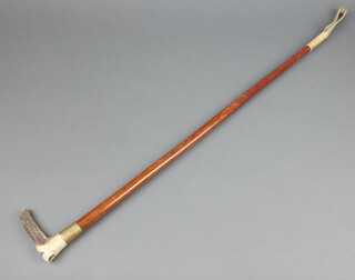 A 19th Century hunting crop with stag horn handle incorporating a whistle 