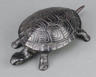 A Victorian novelty metal table bell in the form of a tortoise 18cm, base marked GSS 