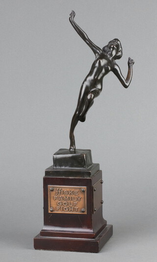 An Art Deco bronze golfing trophy in the form of a running naked lady, on a wooden base marked F F Iske Family Golf Fight 31cm h 