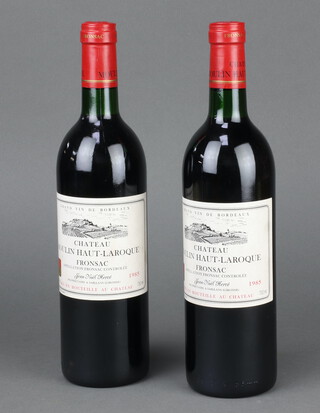 Two bottles of 1985 Chateau Moulin Haut-Laroque Fronsac red wine 