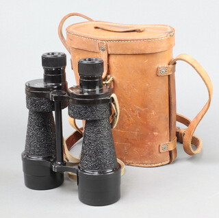 A pair of Bino Prism no.5 MK4 X7 binoculars marked OS 735 GA with broad arrow mark together with a leather carrying case with broad arrow mark and no.5 MK1 