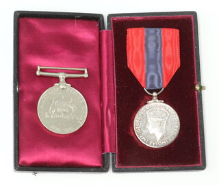 An Australia Service medal to NX174880A Montgomery together with a George VI issue Imperial Service medal to William Percy Orme cased  