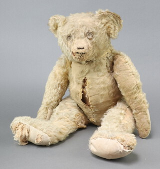 An early 20th Century Steiff or Bing mohair teddybear, wood wool filled with growl box, 58cm 