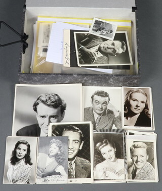 A collection of signed, facsimile signed and plain photographs of Hollywood and British stars to include Rod Skelton, Jimmy Stuart, Richard Attenborough, Errol Flynn, Phylis Calvert, Elizabeth Taylor, Shirley Temple, Raymond Masssey, David Niven, Robert Young, Dorothy Lamour, Irene Dunne, Ronald Reagan, Lana Turner, Spencer Tracy, Margaret O'Brien, Dorothy McGuire, Robert Walker, Esther Williams etc together with a small quantity of signed letters