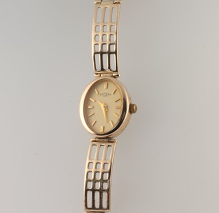A lady's 9ct yellow gold Rotary wristwatch with yellow metal bracelet 