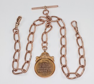 A 9ct yellow gold Albert with T bar, 2 clasps and an engraved fob 46.8 grams 