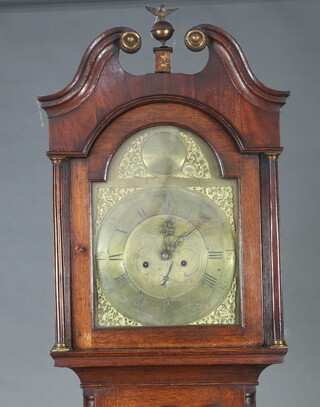 Michael Wilde of Wakefield, an 18th Century 8 day striking longcase clock, the 31cm arched dial marked Michael Wilde of Wakefield with gilt spandrels, Roman numerals, minute indicator, contained in an oak case complete with pendulum and key 223cm h 