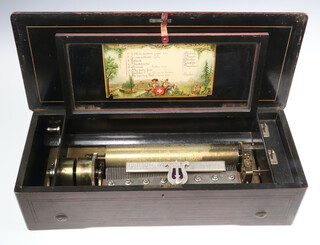 A 19th Century Swiss cylinder music box playing 8 aires contained in a rosewood case, the lid with paper list of 8 aires, the cylinder 27cm, case 15cm h x 56cm w x 23cm d 