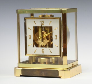 Jaeger Le Coultre, an Atmos clock no.137416, contained in a brushed brass case with 5 glass panels, 24cm x 21cm x 16cm,  